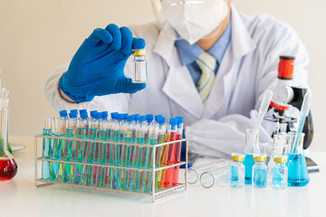 Professional healthcare researchers working in medical science laboratories, pharmaceutical...