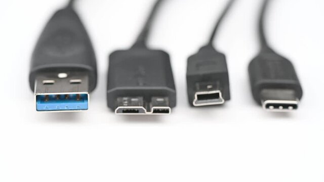 Close up comparison of USB type A type B type C mini micro USB connectors system or connection interface isolated on white background. Transfer information charge for digital camera gadget smartphone 