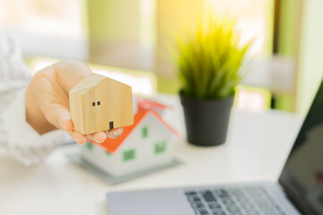 Businessman or home sales representative works Businessman or home sales representative working in...