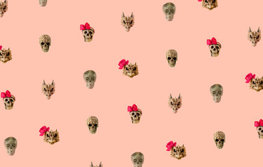 Halloween skull  against  pastel pink background. minimalism. Pattern abstract art