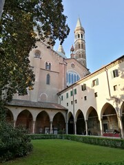Fototapeta premium Basilica of Saint Anthony of Padua (Basilica di Sant'Antonio di Padova), internal view ot the cloisters with the bell tower in the background