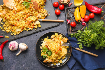 Composition with tasty Shah Pilaf on dark background