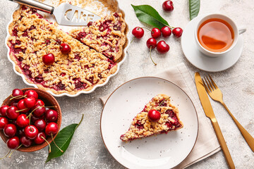Composition with tasty cherry pie and cup of tea on light background © Pixel-Shot