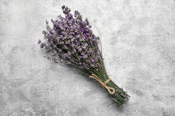 Bouquet of lavender flowers on grey background