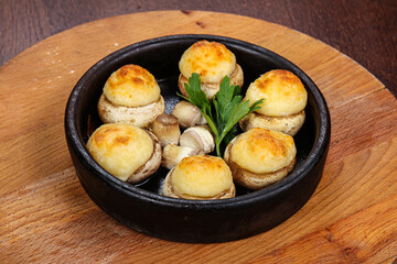 Baked champignon staffed with cheese
