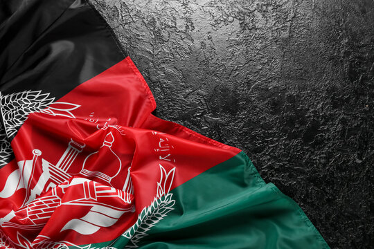 National Afghanistan flag on black background, closeup