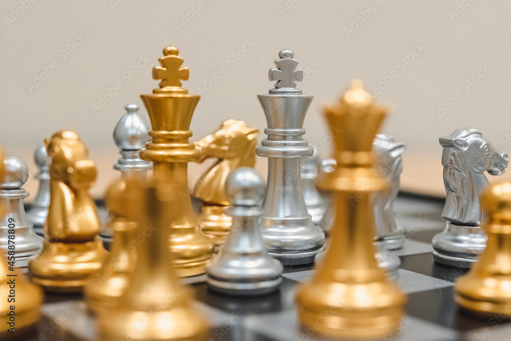 Poster closeup of chess characters on board games. to represent decision making in term of business strateg