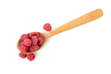 Wooden spoon with raspberries, isolated on white background