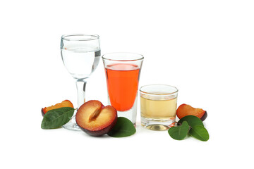 Plum alcohol shots isolated on white background