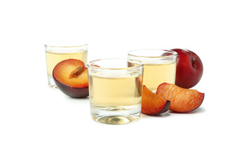 Plum vodka shots isolated on white background