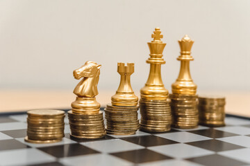 Closeup of chess characters on board games. to represent decision making in term of business strategy to find out the best solution to meet target objective and goal.