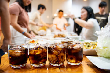Refreshing Bubbly Soda Pop with Ice Cubes. Cold soda iced drink in a glasses - Selective focus, shallow DOF.	
