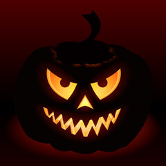 Scary Jack O Lantern halloween pumpkin with candle light.