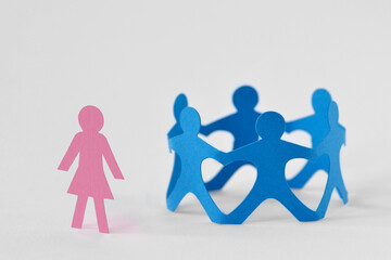 Group of people holding hands in circle and woman alone - Concept of gender discriminaion and...