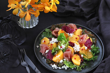 Persimmon and prosciutto ham autumn appetizer salad for Halloween or Thanksgiving. 柿と生ハムの秋サラダ　オータムサラダ