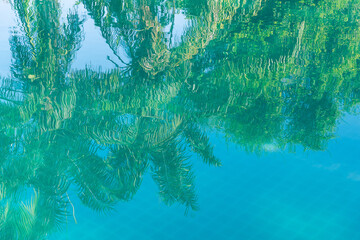 Wave Water in swimming pool. Blue ripped water in pubic swimming pool.