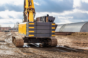Powerful hydraulic drilling rig on a construction site. Installation of bored piles by drilling....