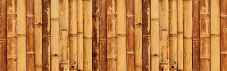 Panorama of Brown old Bamboo fence texture and background seamless