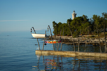 Fototapeta na wymiar Traditional method for storing fishermen's boats. Savudrija, Istria, Croatia.
