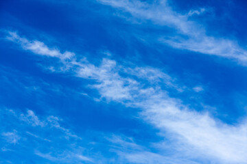 Naklejka na ściany i meble Blue sky and clouds. Beautiful background with blue sky and white clouds