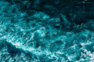 Aerial view to seething waves with foam. Waves of the sea meet each other during high tide and low tide