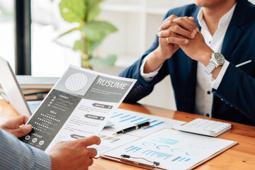 Close up interviewer interview candidate apply for job at meeting room in office.