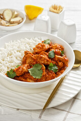butter chicken, curry of spicy chicken with rice