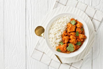 butter chicken, curry of spicy chicken with rice - obrazy, fototapety, plakaty