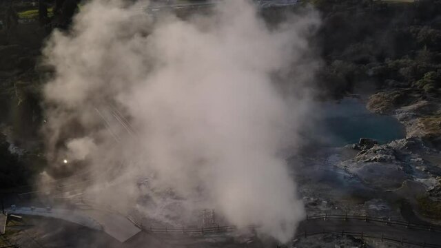 Drone fly over steam from New Zealand largest geyser - Pohutu in Whakarewarewa Thermal Valley, Rotorua