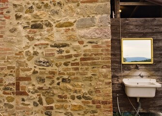 An external sink under a mirror in the garden of a farmhouse in the countryside (Umbria, Italy, Europe) - 458906001