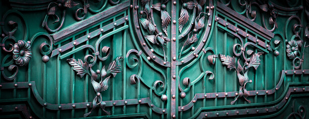 large style metal gates with elements leaf