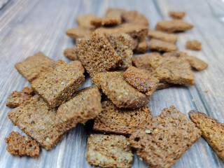 Natural croutons snacks close-up. Rye croutons. Dried bread croutons.