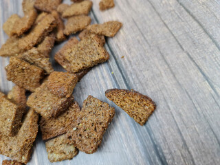 Natural croutons snacks close-up. Rye croutons. Dried bread croutons.