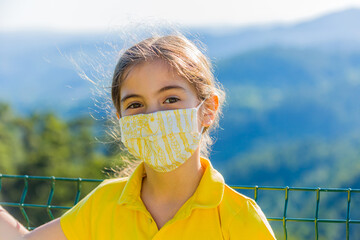 Little girl with mask