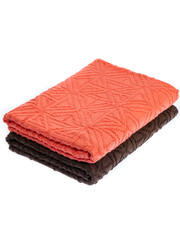 folded colored towels on white background