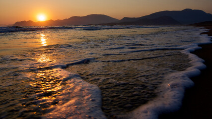 Spawning place of Caretta Caretta turtles: Iztuzu beach. Golden sun rays reflecting off the sea at...