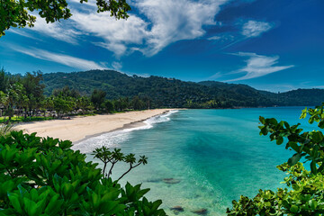 A quiet beautiful Kata Noi Beach on Phuket Island with the Turquoise blue Andaman Sea.