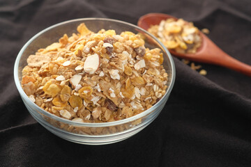 Home Made Musli in a bowl on black,