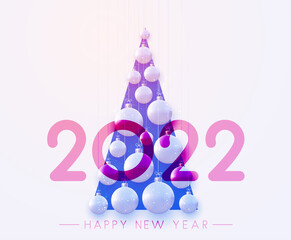 2022 sign over hanging beautiful Christmas baubles.