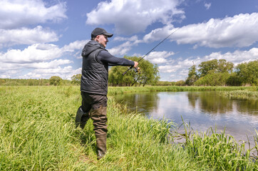 Fisherman catches the view from the back.