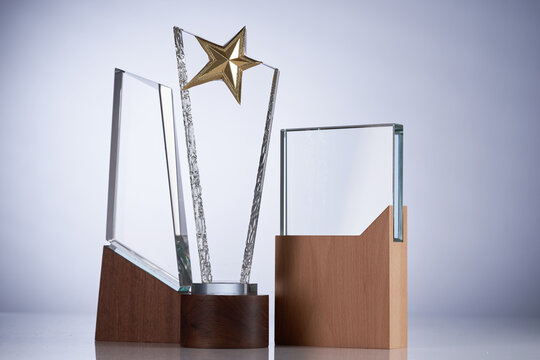 group of crystal trophy on gray  background