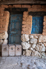 Wooden door in old facade