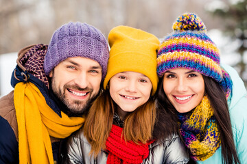 Photo of cheerful family mom dad daughter happy positive toothy smile enjoy time together winter holiday