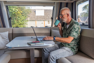 working from home form inside a caravan - 458935803