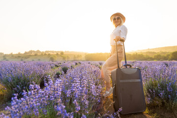 woman with bag in lavender field.