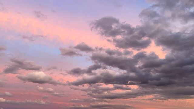 Afternoon clouds in sunset time, time-lapse
