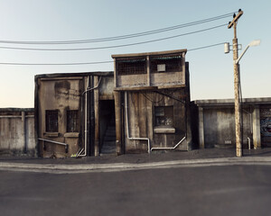 Old quiet street with deserted concrete buildings and an electricity pole with a blue sky. 3D...