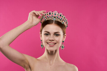 attractive woman with a crown on her head makeup decoration Studio Model