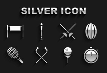 Set Ice hockey sticks, Rugby ball, Stopwatch, Golf on tee, Tennis racket, Fencing, Volleyball net and Baseball bat icon. Vector