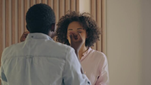 Annoyed girlfriend talking to boyfriend at home, disagreement with partner